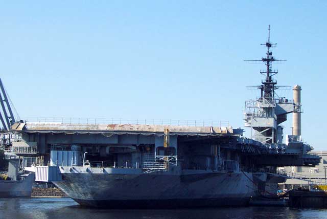 An active aircraft carrier was protected by a guard boat but they didn't mind us getting near the old ships.